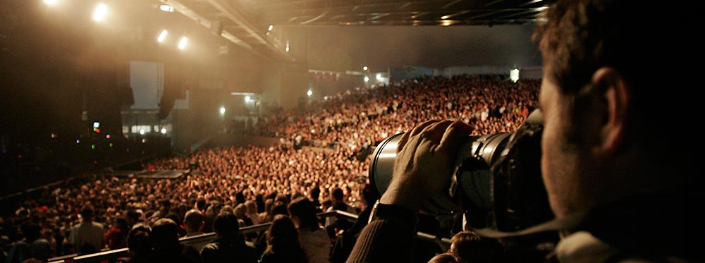 Img8 : Photogrphe avec télé-objectif à un concert